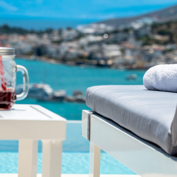Sunbeds by the pool with sea view from Elounda Sunshine Place